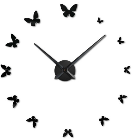 Dekoratívne nástenné hodiny so siluetami motýľov namiesto číselníka. Dekoratívne nástenné hodiny so siluetami motýľov namiesto číselníka.