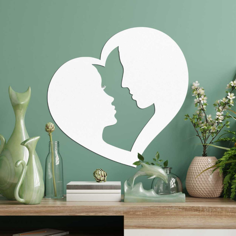 Srdcový tvar dekorácie, v ktorom sú prepojené kontúry dvoch tvárí.