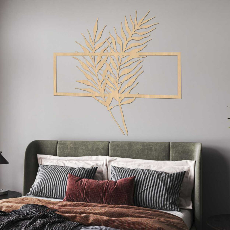 Drevený obraz s minimalistickými listami v ráme...