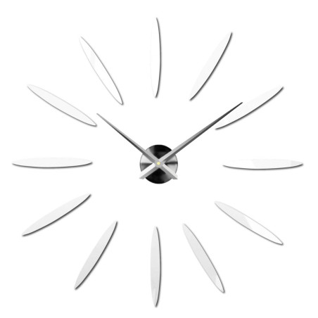 Kreatívne rozmiestnené hodiny, ktoré vytvárajú efekt slnečných lúčov pomocou zlatých prvkov. Kreatívne rozmiestnené hodiny, ktoré vytvárajú efekt slnečných lúčov pomocou zlatých prvkov.